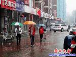 營(yíng)口雨中眾生相